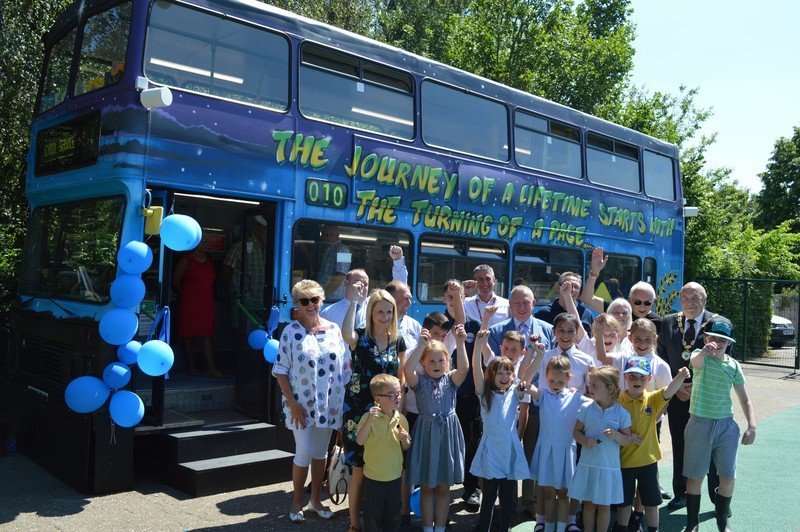 Phelan volunteers transform a bus into a school library!