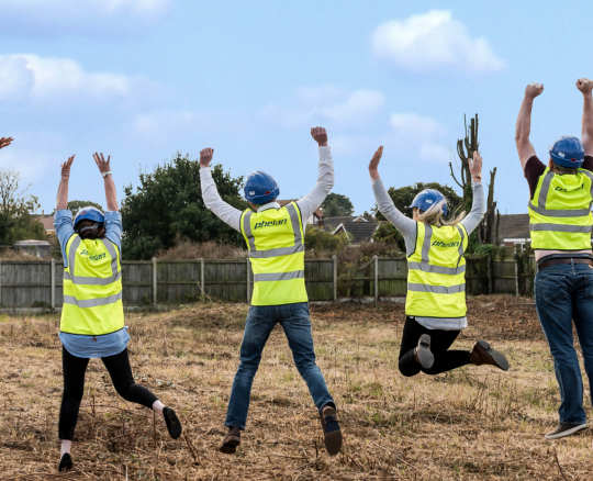 Construction Staff Jumping